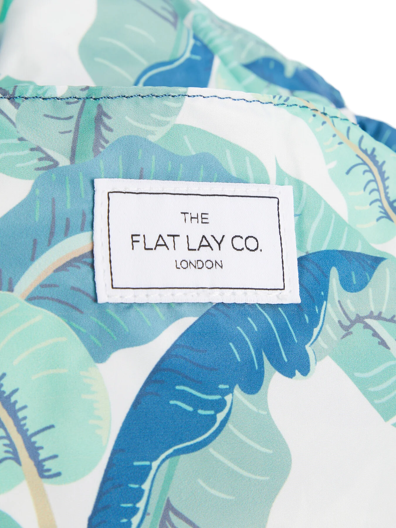 Open Flat Makeup Bag In Tropical Leaves - Image 4